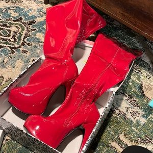 Red patent leather over the knee patent boots